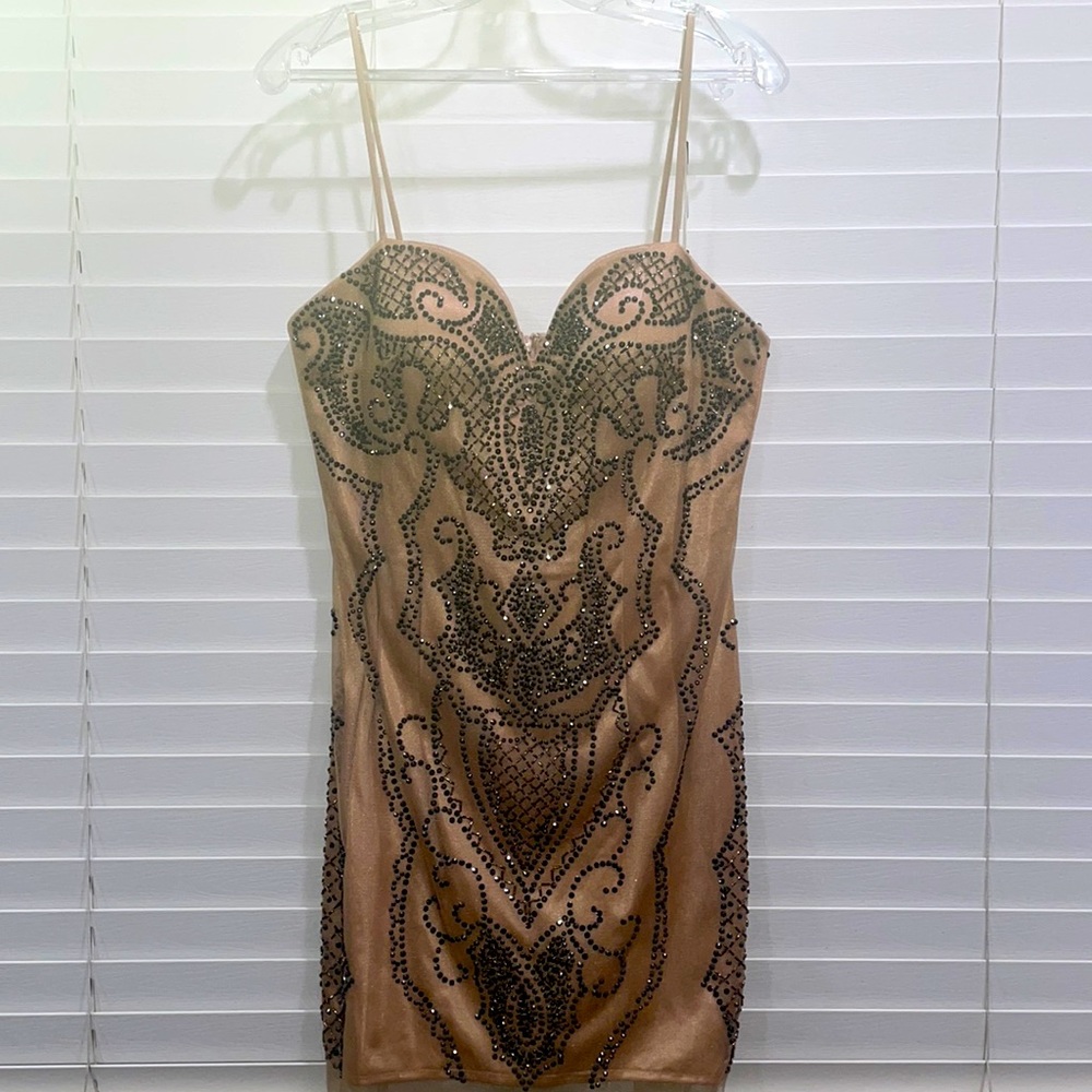 Short cocktail dress, size 11/12. Nude with black beading